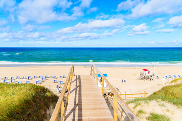 Walkway to beautiful beach in Westerland village on Sylt island, North Sea, Germany