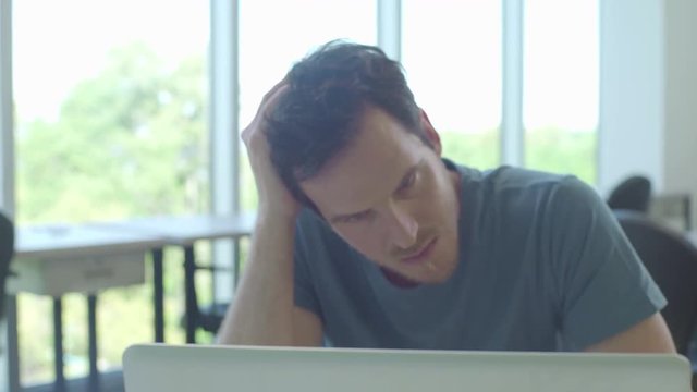 Man using laptop computer