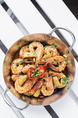 stir fry prawns in spicy asian pineapple and herbs sauce