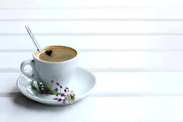 espresso with hot heart/ mug of black coffee and fragrant flower