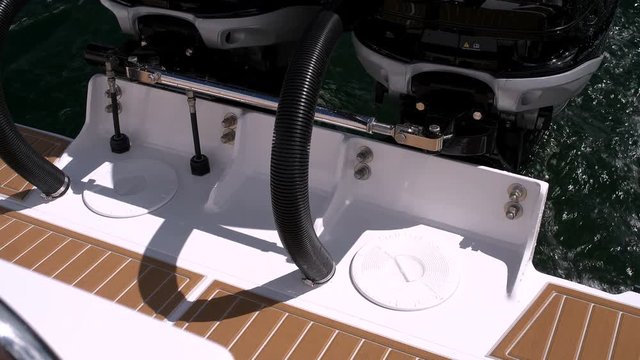 Detail of technical area close to the outboard engines at the stern of a RIB.