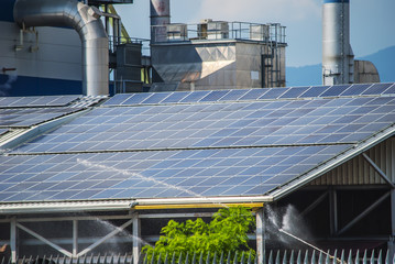 solar panels on top of industrial roof object