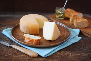 French cheese, baguette and honey