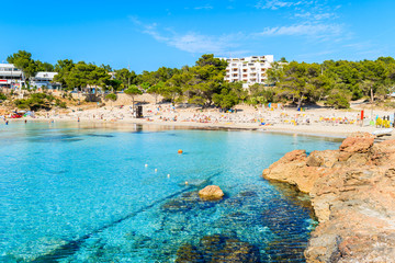 View of beach with azure sea water in Cala Portinatx bay, Ibiza island, Spain © pkazmierczak