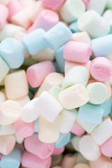 Background or texture of colorful mini marshmallows.