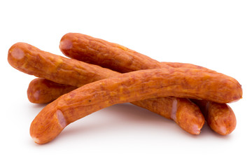 Stack of smoked sausages isolated on a white background.