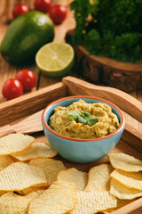 Guacamole - mexican avocado dip with tomato and lime. 