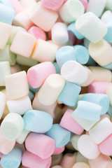 Background or texture of colorful mini marshmallows.