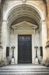 Fototapeta na wymiar Old gothic door. Luxurious old building in Dresden