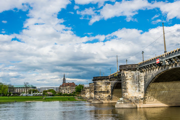 Ancient stone bridge across the Elbe river in the city of Dresden, Land of Saxony, Germany