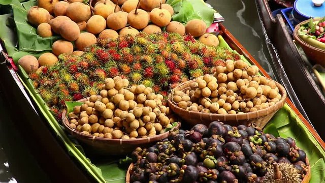 Fruits and vegetables were sold on boat the Damnoen saduak floating market is famous in Thailand