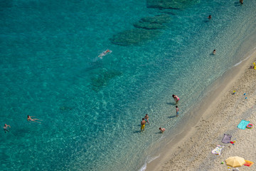 Aerial view of people having fun in Tropea beach - Tropea, Calabria, Italy