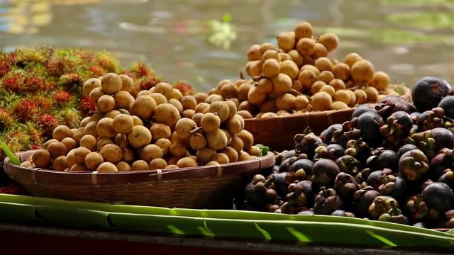 Fruits and vegetables were sold on boat the Damnoen saduak floating market is famous in Thailand