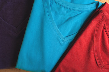 Colorful cotton t-shirts, top view