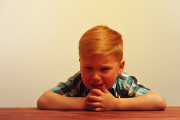 Naklejka premium Portrait of little unhappy crying boy