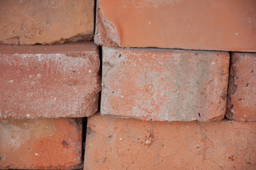 Obraz premium Pile of red bricks. Closeup
