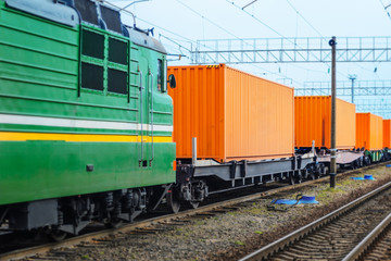 Transportation of cargoes by rail in containers. Railway infrastructure background