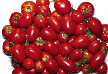 Few red tomatoes isolated