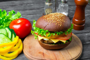 Homemade hamburger with fresh vegetables