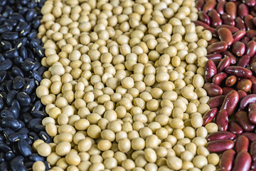 close up red bean, black beans and soy bean on wooden table, Vegetarian food background and effect filter.