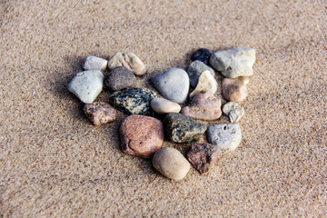 I Love You on Sand Background, Stone Heart. Valentine's Day Concept