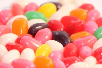         Candy, coated with different colors and flavors.

