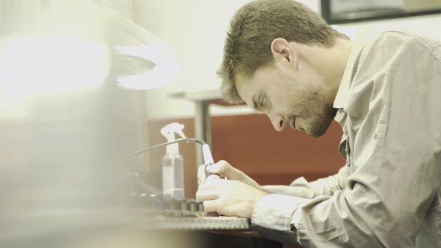 Engineer soldering