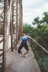  beautiful ballerina dancing in the bridge