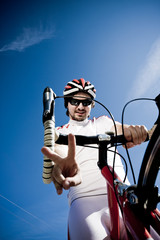 Obraz premium Cyclist Showing Victory Sign