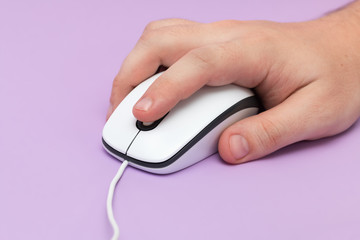 USB mouse with cable in hand