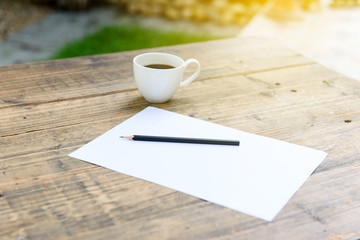 Paper pencil and coffee