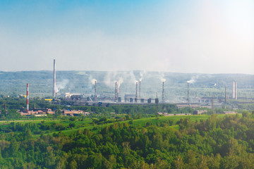 Old steel factory. Smoke. Environmental pollution and global warming.