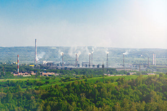 Old steel factory. Smoke. Environmental pollution and global warming.