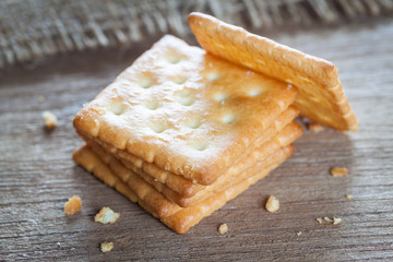Crackers or biscuit on wooden background