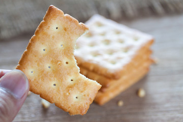 Crackers or biscuit on wooden background