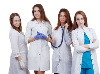 Fototapeta premium A team of young doctors in disguise on a white isolated background