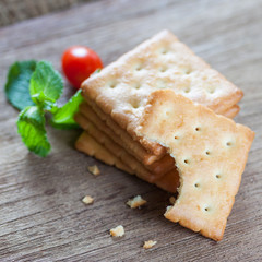 Crackers or biscuit on wooden background
