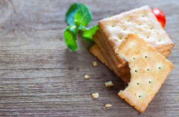 Crackers or biscuit on wooden background