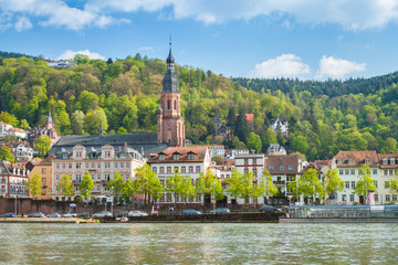 Church of the Holy Spirit in Heidelberg, Germany with old town square in background - obrazy, fototapety, plakaty