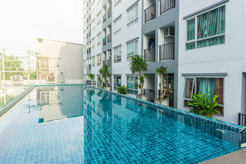 Fototapeta na wymiar High rise condominium buildings with swimming pool.