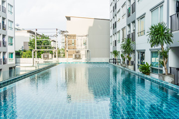 High rise condominium buildings with swimming pool.