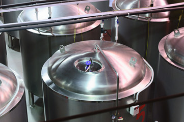 Metal tanks for storing and ripening beer.