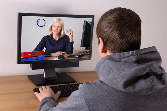business blog concept - young man watching video at home