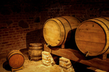 wine cellar, wine barrels, wine storage, several barrels of wine