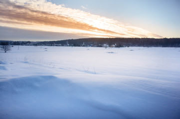 snow country road in sunset