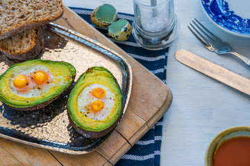 Baked avocado with quail eggs
