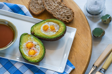 Baked avocado with quail eggs