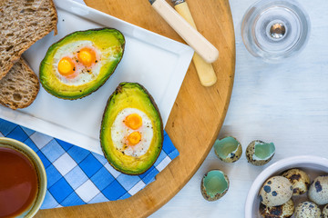 Baked avocado with quail eggs
