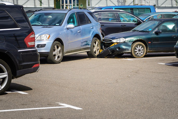 Car accident in the parking lot.