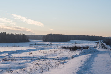 Winter russian landscape. The field and 